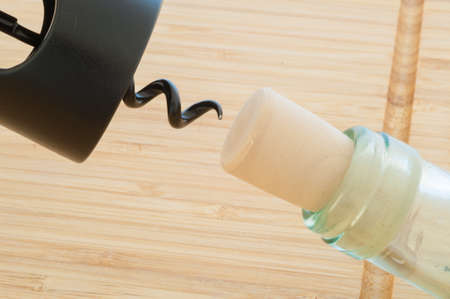 beautiful raw corkscrew on cutting boardの写真素材