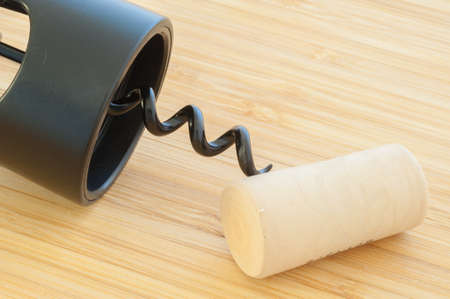 beautiful raw corkscrew on cutting boardの写真素材