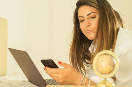 beautiful girl buy a travel around a world on lineの写真素材