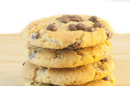 beautiful macro of chocolate cookies in white backgroundの写真素材