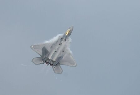 Stealth jet fighter F-22 Raptor  climbing  - Arctic Thunder airshow 2008 - Anchorage - Alaska - USA