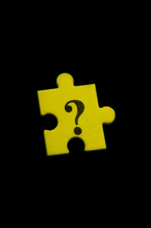 Isolated question mark puzzle textured yellow pieceの写真素材