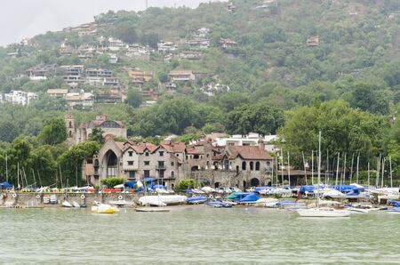 Cloudy landscape: lake shore of Valle de Bravo, Mexicoの写真素材