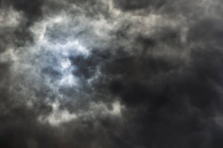 Strange reflection of a stormy sky, dark clouds filling the frame