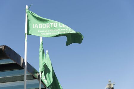 Capital Federal, Buenos Aires / Argentina; Feb 19, 2020: Rally in favor of legal, safe and free abortion; green flag, cause symbol, wavingのeditorial素材