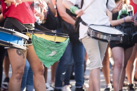 Capital Federal, Buenos Aires / Argentina; Feb 19, 2020: women playing drums at a rally in support...