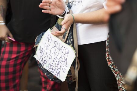 Capital Federal, Buenos Aires / Argentina; Feb 19, 2020: detail of a rally in support of legal abortion; poster carried by a participant: neither submissive nor silent, strong and empowered womanのeditorial素材