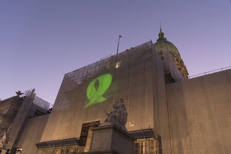 Capital Federal, Buenos Aires / Argentina; Feb 19, 2020: rally in favor of the approval of the law of legal, safe and free abortion; green handkerchief projected on the National Congressのeditorial素材