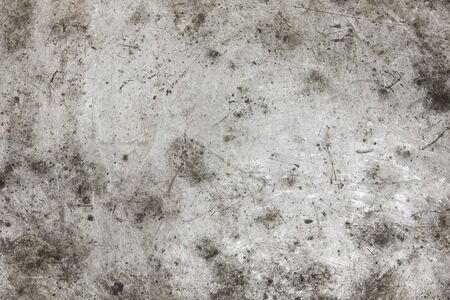 Abstract background, old worn metal texture, with marks such as stains and scratchesの写真素材