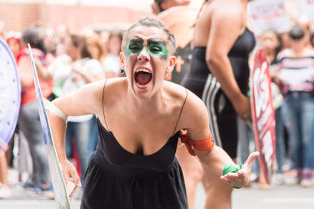 CABA, Buenos Aires / Argentina; March 9, 2020: international women's day. Young woman, shouting,...
