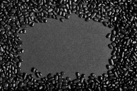Black sprinkles frame on black background, halloween theme, close-up image, copy spaceの写真素材