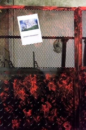 CABA, Buenos Aires / Argentina; Aug 23, 2019: Street fence with red handprints and a poster with a...