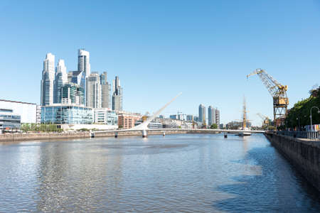 Puerto Madero, an exclusive neighborhood in Buenos Aires, Argentina, a popular tourist spot with modern architecture, on a sunny day.の写真素材