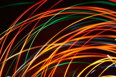 Color lights in motion, abstract dynamic colorful background.の写真素材
