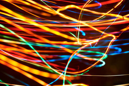 Abstract dynamic background, colorful light lines. Concepts of motion, energy and vitality.