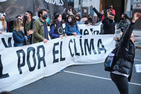 CABA, Buenos Aires, Argentina; Sept 24, 2021: Environmental activism, people marching during the Global Climate Strike.のeditorial素材