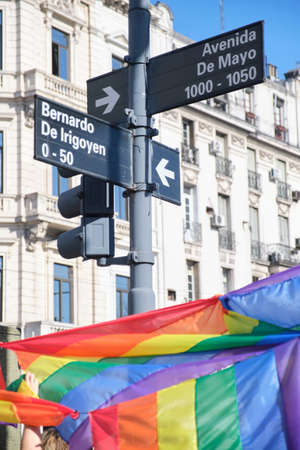 Buenos Aires, Argentina; Nov 6, 2021: LGBT Pride Parade. Symbolic rainbow flags on a downtown street.のeditorial素材
