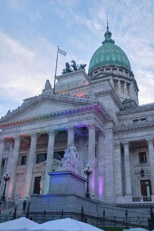 Buenos Aires, Argentina; Nov 6, 2021: Pride Parade. National Congress illuminated with colored lights to show support for the LGBT community.のeditorial素材