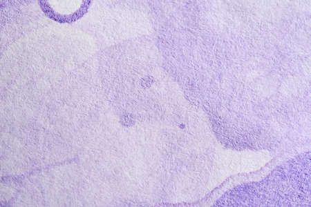 Lilac background, textured paper painted with pastel purple paint in a flowing abstract composition...