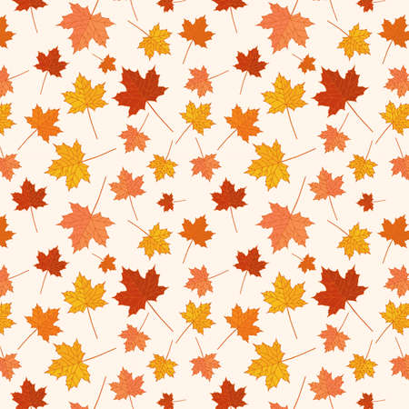 Autumn or fall seamless pattern, fallen leaves in red, orange and yellow over a pastel background, a warm seasonal design.の写真素材