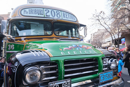 Buenos Aires, Argentina, June 20, 2022: Green Bedford Alcorta 1961 old vintage bus for public transport, line 208, painted with fileteado porteÃ±o style, during an exhibition of the antique bus museumのeditorial素材