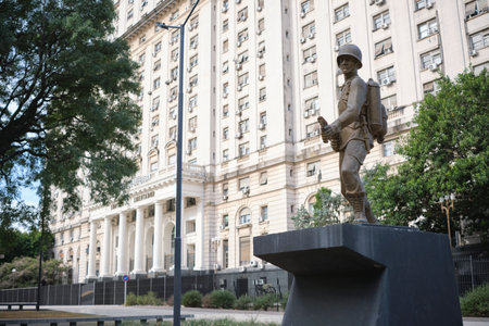 March 14, 2023, Buenos Aires, Argentina: Sculpture of a soldier in the Arms Square, Argentine Army, in front of the Libertador building, Ministry of Defense headquarters.のeditorial素材