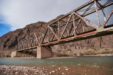 Old bridge over the Mendoza River in Potrerillos, Argentina. Composition without people, with copy space.の写真素材