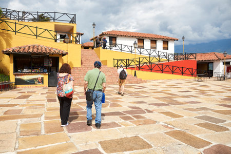 Aratoca, Santander, Colombia, Nov 23, 2022: Tourists seen from the back walking through Chicamocha National Park, a popular tourist destination in this Andean region.のeditorial素材