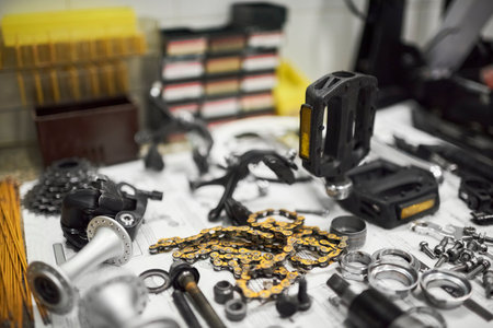 Bicycle parts in a repair shop. Composition with selective focus and copy space.