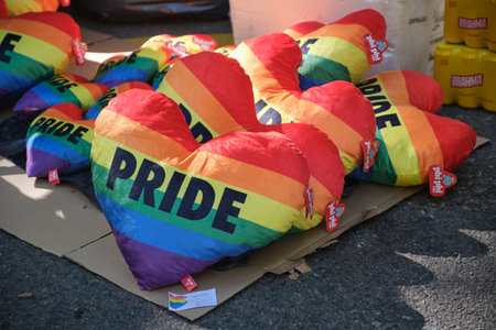 Buenos Aires, Argentina; Nov 4, 2023: LGBT Pride Parade. Come out of rainbow hearts with the word...