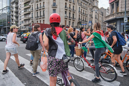 Buenos Aires, Argentina, Feb 16, 2024: Caravan protest through downtown in solidarity with Palestine and against Israel genocide attack.のeditorial素材