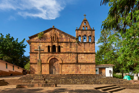 Barichara, Santander, Colombia; November 25, 2022: Facade of Santa Barbara Chapel, catholic stone temple of Romanesque architecture.の写真素材