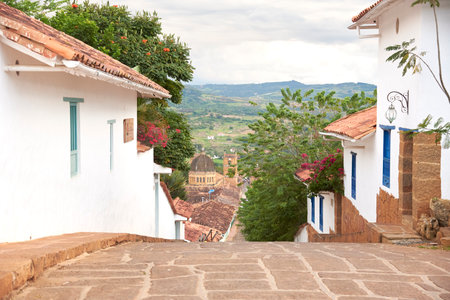 Barichara, Santander, Colombia; November 25, 2022: Colonial cobbled street of this touristic picturesque town, declared a National Monument and known for being the most beautiful Colombian village.のeditorial素材