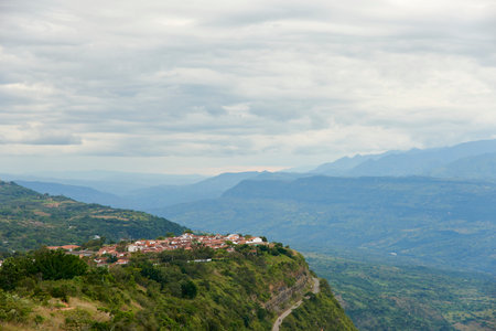 Barichara, the most beautiful town in Colombia, seen from a nearby lookout point, a touristic natural area with great views of the surrounding mountains.の写真素材