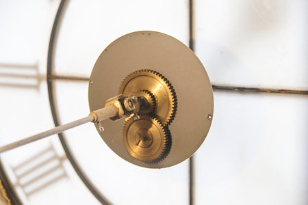 Tower clock with its mechanism and gears in view.