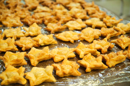 Pastelitos, traditional Argentine flaky snack, especially consumed on national holidays, freshly fried and ready to eat.の写真素材