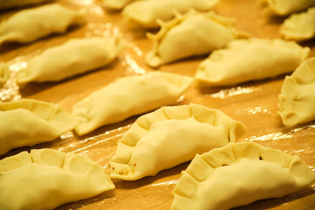 Argentinean Empanadas ready to bake in the oven, traditional food from Argentina.