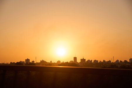 Orange sunset sky and the skyline of Buenos Aires