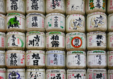 Meiji-Jingu temple, Tokyo, Japan - May 18, 2018 : Wall made of Sake Barrels at the entrance of Temple.のeditorial素材
