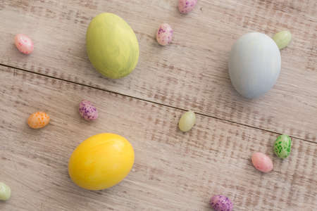pastel colored painted Easter eggs and jelly beans