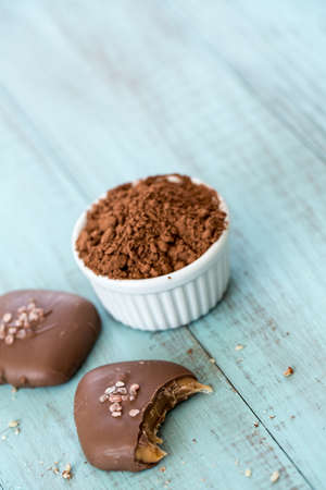 Salted caramel candies with cocoa powder room for textの写真素材