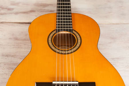 Acoustic guitar close up from aboveの写真素材