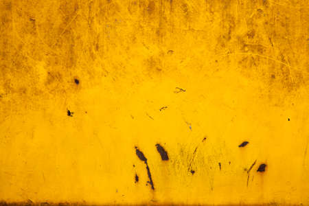 Yellow and gold background texture with brownの写真素材