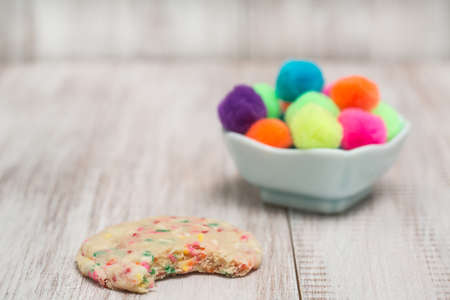Colorful confetti cookie with decorative balls