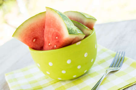 Watermelon slices in a bowl as a summer snack foodの写真素材