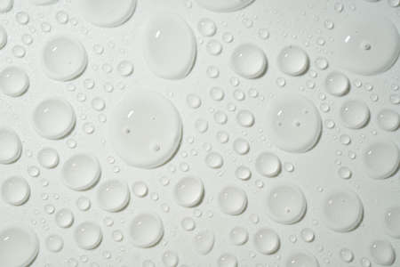 Water drops scattered on the tableの写真素材