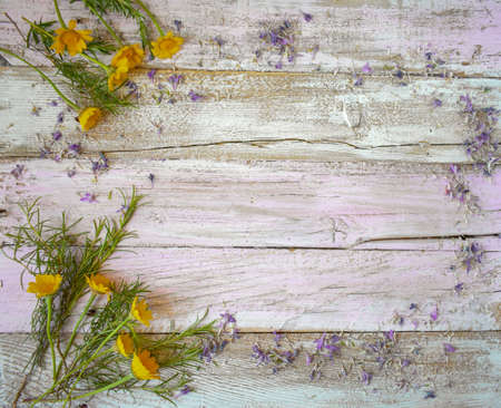 Flowers on Wooden Table Background