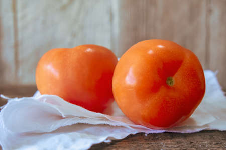 Fresh Red Tomatoes on woodenの写真素材