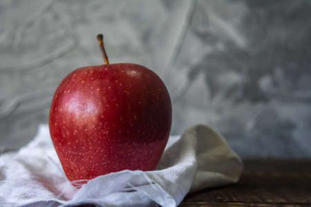 Red Apple Fruit On wooden Tableの写真素材