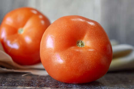 Fresh Red Tomatoes on woodenの写真素材